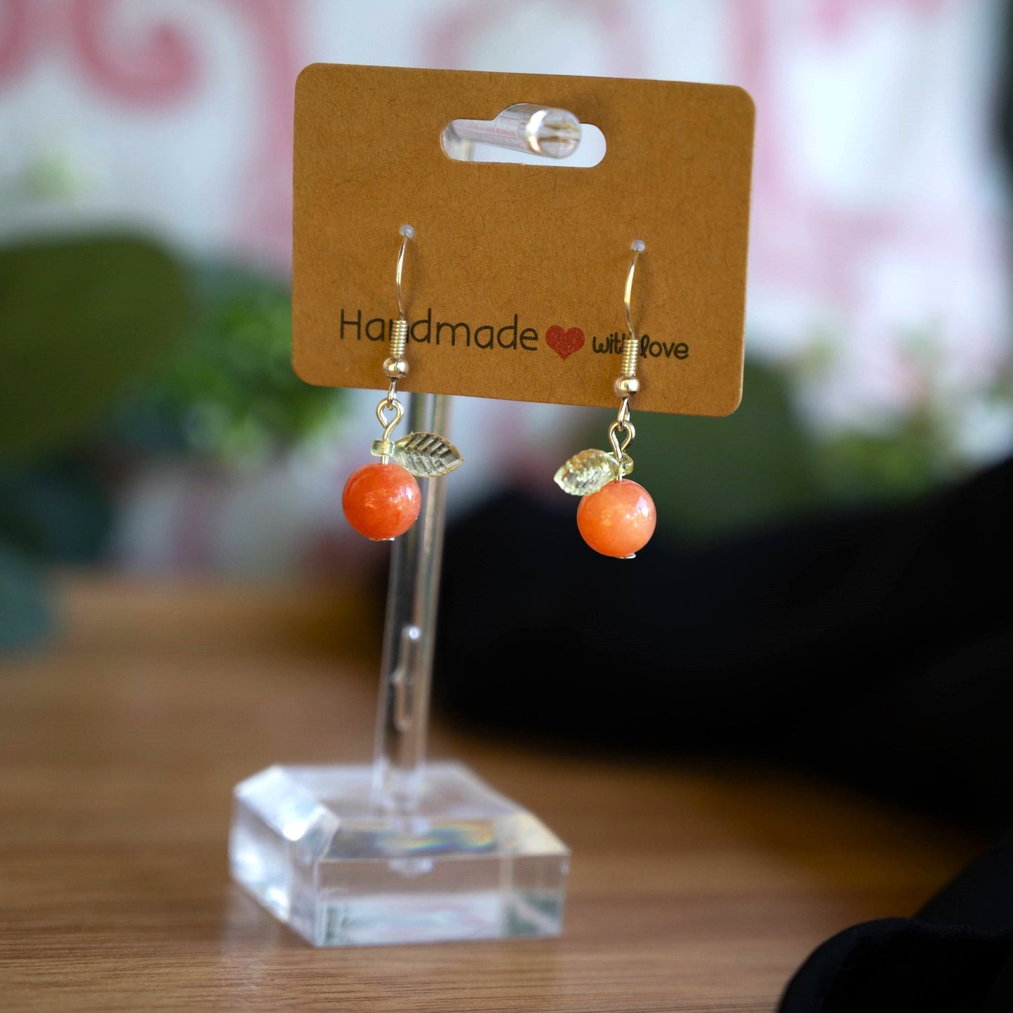 Orange Jade Earrings with Green Leaf Accents