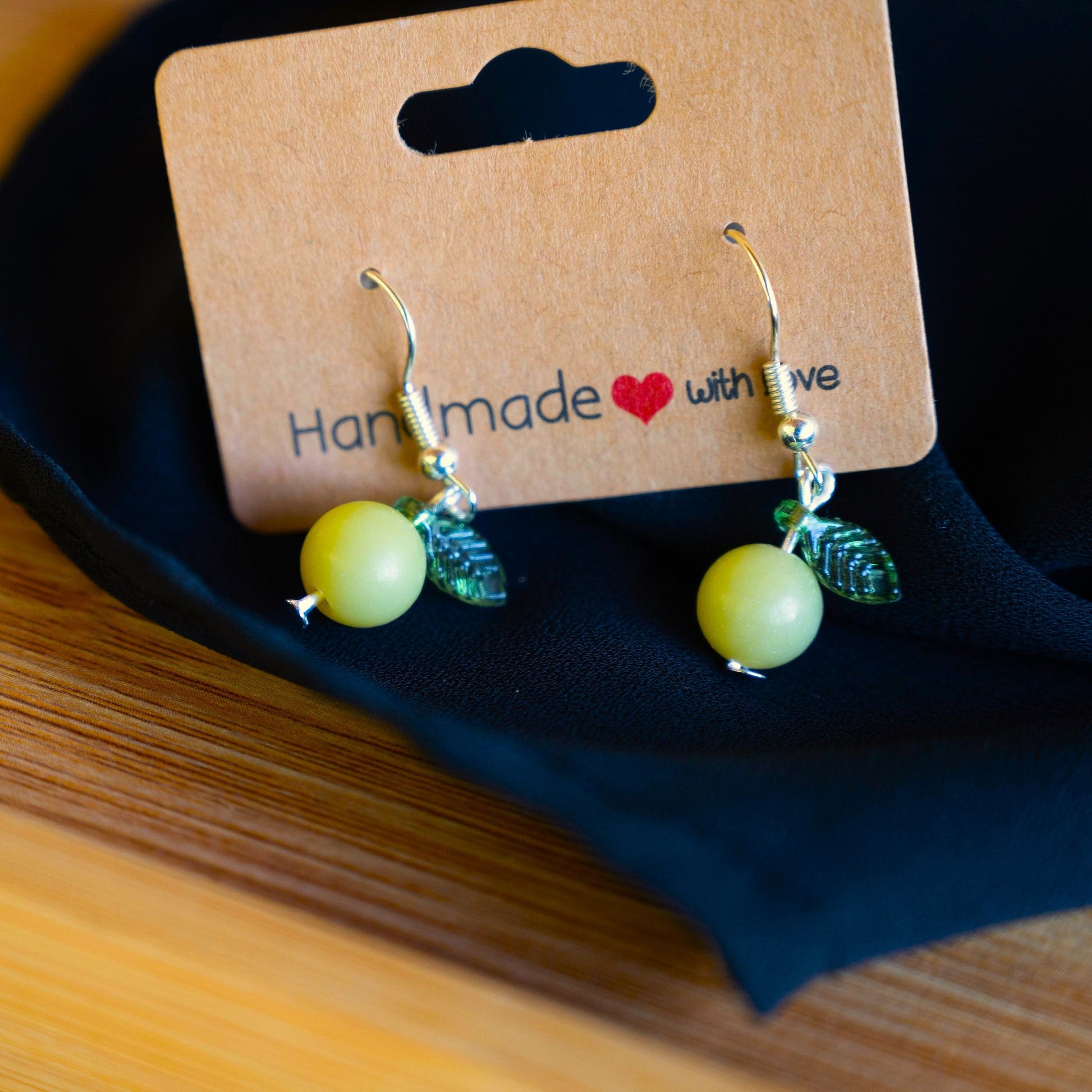 Yellow Jade Lemon Earrings with Green Leaf Accents