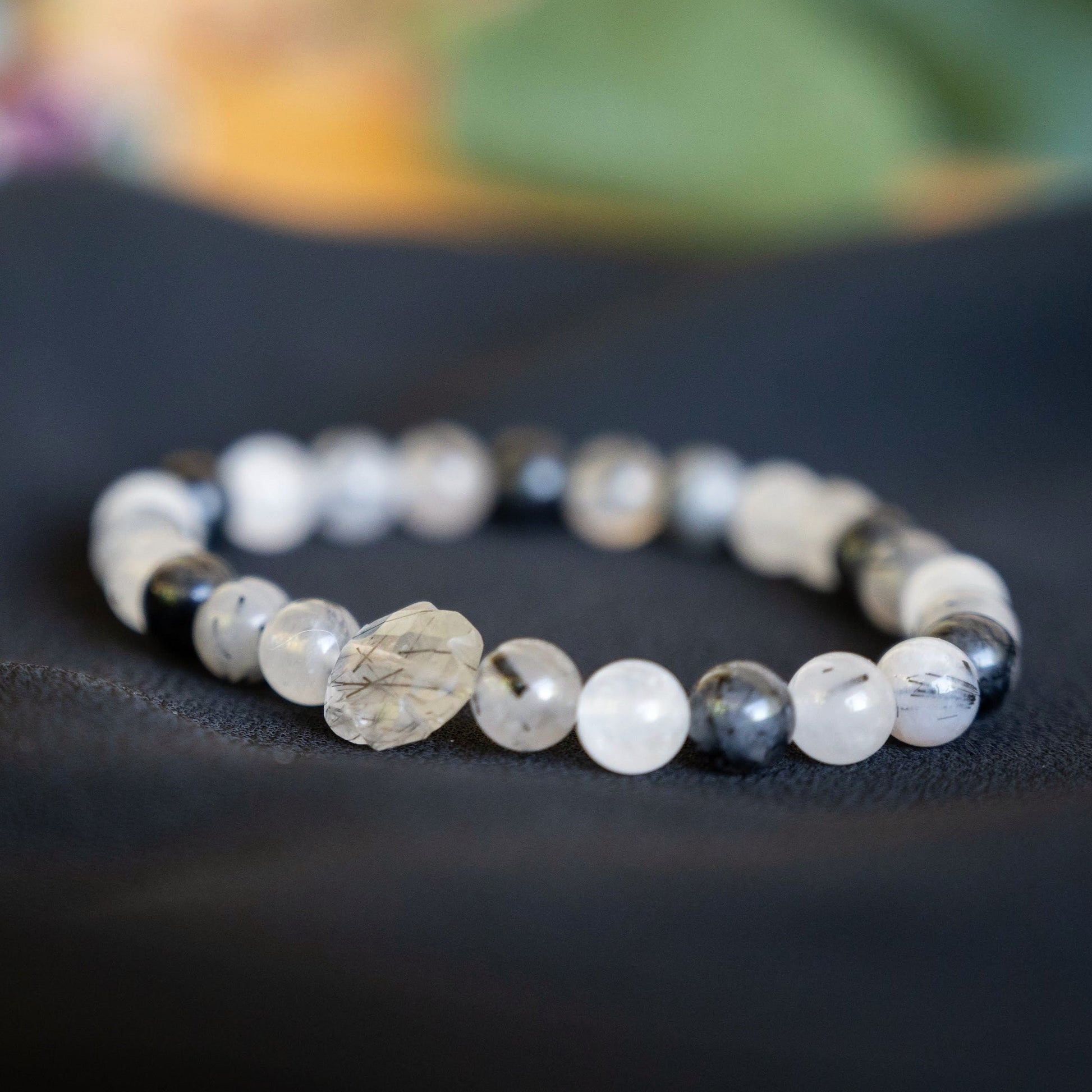 Tourmalinated Quartz Beaded Bracelet with Flower Accent