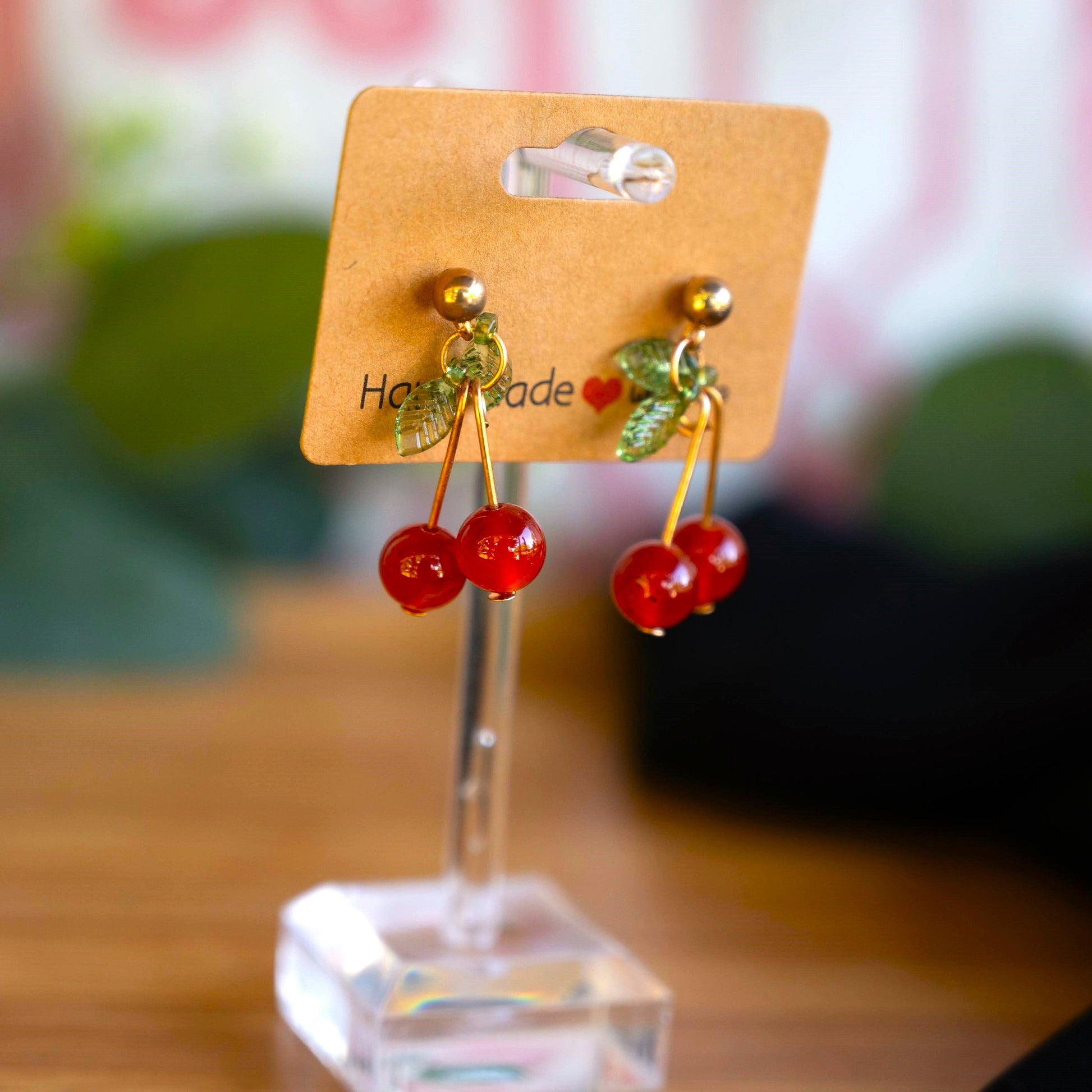 Cherry Carnelian Earrings with Green Leaf Accents