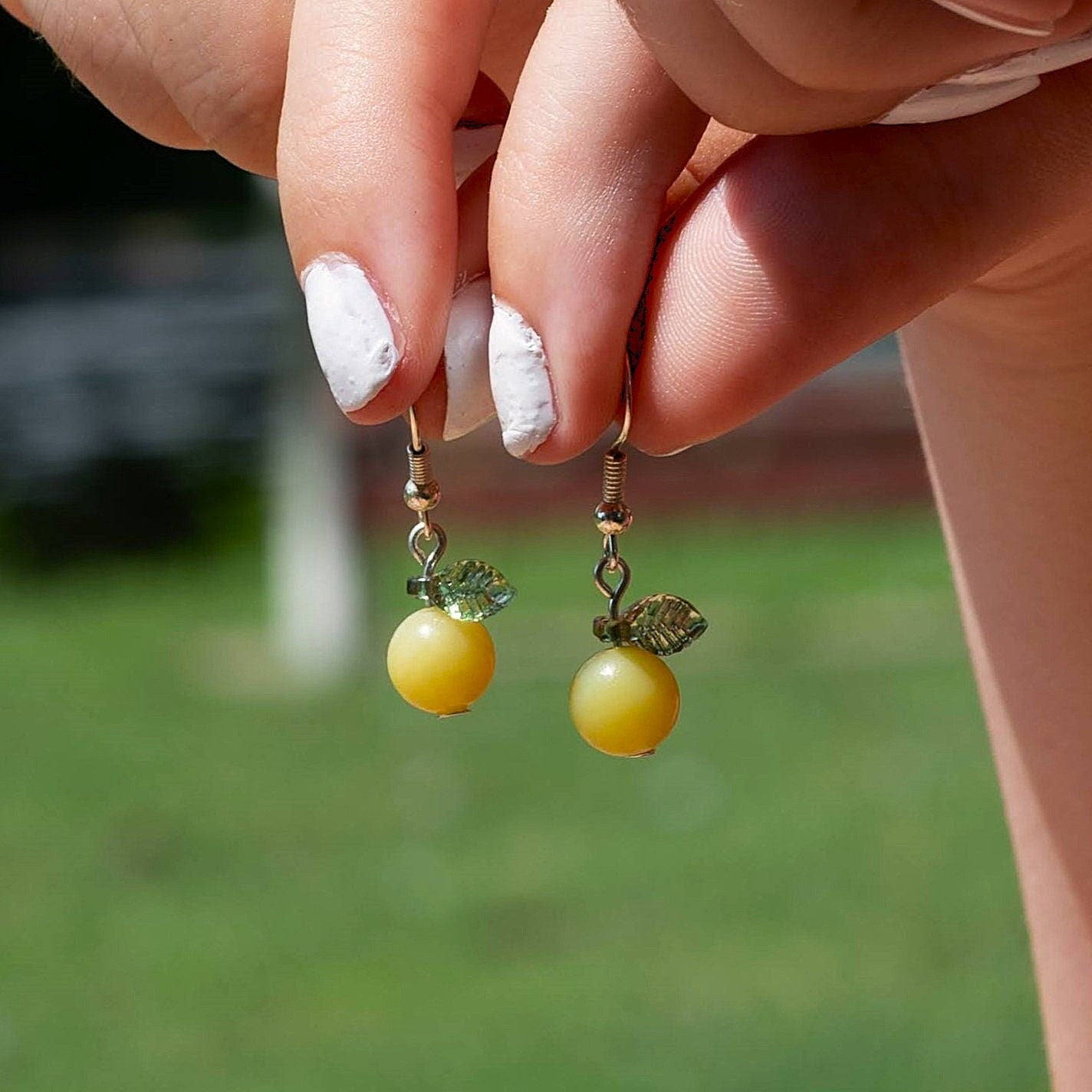 Yellow Jade Lemon Earrings with Green Leaf Accents