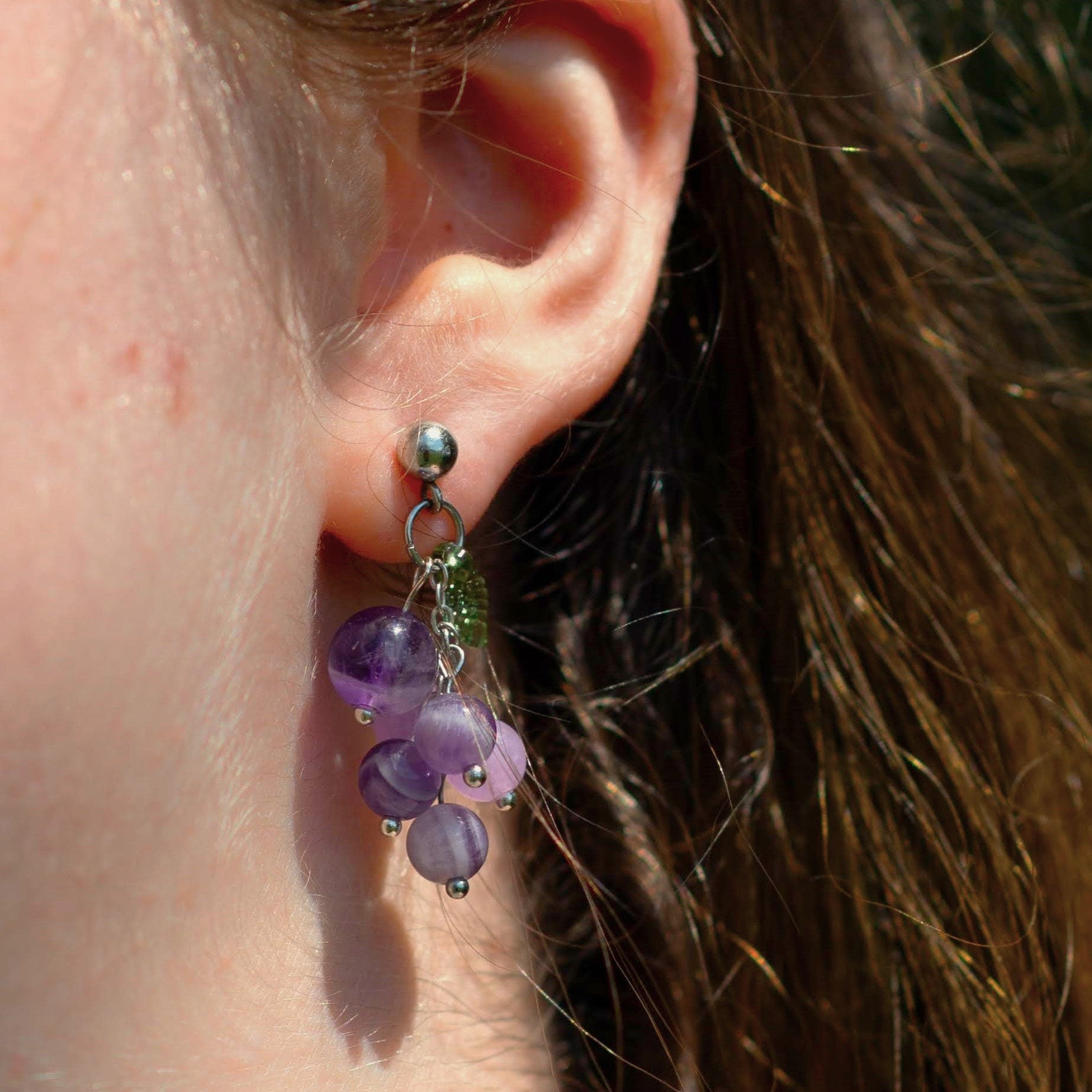 Grape Cluster Amethyst Earrings on ear