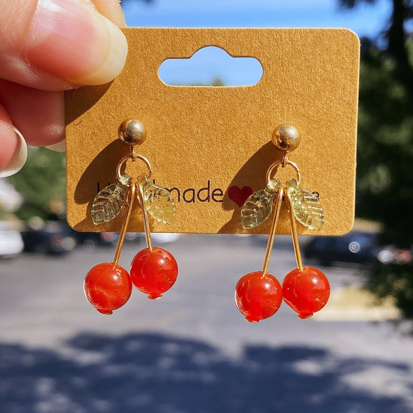 Cherry Carnelian Earrings with Green Leaf Accents